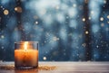 Atmospheric Christmas window sill decoration with white candle burning