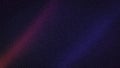 Atmospheric dark background with subtle magenta and blue light rays, featuring a grainy texture perfect for moody and abstract Royalty Free Stock Photo