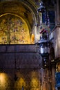 Vertical: Foreground of incense burner and Tree of Jesse mosaic inside St. Mark`s Balsica in Venice. Royalty Free Stock Photo