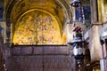 Foreground of incense burner and Tree of Jesse mosaic inside St. Mark`s Balsica in Venice. Royalty Free Stock Photo