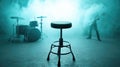 Atmospheric empty stage with drum set and guitarist in blue smoke Royalty Free Stock Photo
