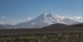 Atmospheric evening panorama of Mount Elbrus with snow and glaciers in the evening in the mountains