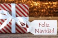 Atmospheric Gift With Label, Feliz Navidad Means Merry Christmas