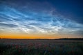 Atmospheric phenomenon of noctilucent clouds night shining clouds NLC Royalty Free Stock Photo