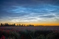 Atmospheric phenomenon of noctilucent clouds night shining clouds NLC Royalty Free Stock Photo