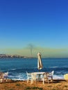 View of Jounieh, Lebanon and electricity plant of Kaslik producing dark cloud of pollution