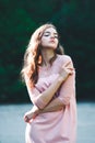 Atmospheric portrait of young beautiful woman, long hair and casual makeup