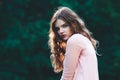 Atmospheric portrait of young beautiful woman, long hair and casual makeup Royalty Free Stock Photo