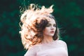 Atmospheric portrait of young beautiful woman, long hair and casual makeup Royalty Free Stock Photo