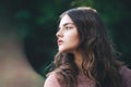 Atmospheric portrait of young beautiful woman, long hair and casual makeup Royalty Free Stock Photo