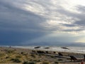 Atmospheric view of empty Ayia Eirini beach in Cyprus on a windy stormy day Royalty Free Stock Photo