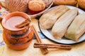 Atole de chocolate, mexican traditional beverage and tamales, Made with cinnamon and chocolate in Mexico