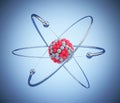Atom model with orbital electrons isolated on blue background. 3D illustration Royalty Free Stock Photo