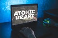 Atomic heart new video game. Close up shoot of playing video game on PC
