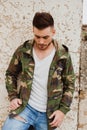 Atractive guy with jacket with military stylish Royalty Free Stock Photo