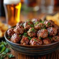 an atractive and tastefull image of meatballs portion and pint of beer together