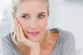 Atrractive blonde woman thinking Royalty Free Stock Photo