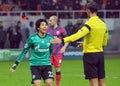 Atsuto Uchida reacts during UEFA Champions League game Royalty Free Stock Photo