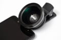 Attachable camera lens for a smartphone Royalty Free Stock Photo