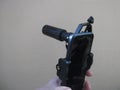 Attachment between monocular telescope and smartphone on a tripod
