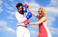 Attack is best defence. Couple in love fighting. Defend your opinion in confrontation. Man and woman fight boxing gloves