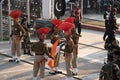 Indian Border Security Force folds the India flag after the border closing ceremony with