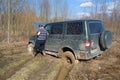 An attempt to remove the stuck on a forest road UAZ-Patriot