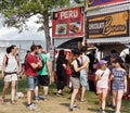 People Lined Up For Chocolate Covered Bananas