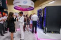 Attendees listen stand-attendant at Intel booth of exhibition