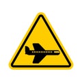 Attention aircraft. Yellow prohibitory road sign. Danger Airline