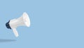 Attention and announcement concept with white-blue megaphone on blue background. Minimal advertising concept