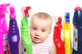 Attention: Baby wants to play with cleaner Royalty Free Stock Photo