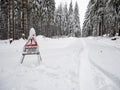 Attention forestry work in winter in german