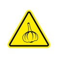 Attention garlic in yellow triangle. Road sign attention pungent