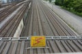 Attention high voltage sign train tracks in german language