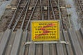 Attention high voltage sign train tracks in german language