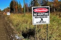 An attention no hunting, men working sign Royalty Free Stock Photo
