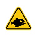 Attention piranha. Dangers of yellow road sign.