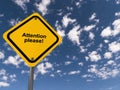 attention please traffic sign on blue sky Royalty Free Stock Photo