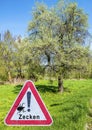 Attention ticks sign in german Royalty Free Stock Photo