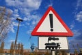 Attention train, road sign near industrial railway Royalty Free Stock Photo