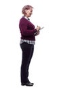 Attentive adult woman signing a document. isolated on a white