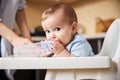 Attentive baby boy staring at screen of camera Royalty Free Stock Photo