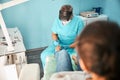 Professional chiropodist treating feet during medical procedure