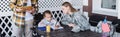 Attentive mother in military uniform sitting