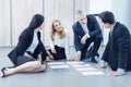 Attentive office workers listening their colleague