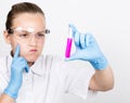 Attentive schoolgirl conducting a chemistry experiment at elementary science class Royalty Free Stock Photo