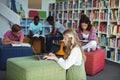 Attentive students studying in library Royalty Free Stock Photo