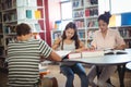 Attentive students studying in library Royalty Free Stock Photo