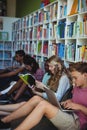 Attentive students studying in library Royalty Free Stock Photo